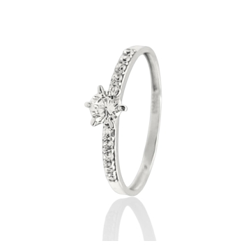 ANILLO ORO BLANCO 18 KILATES ESTILO SOLITARIO SEIS GARRAS CON CIRCONITAS EN EL BRAZO